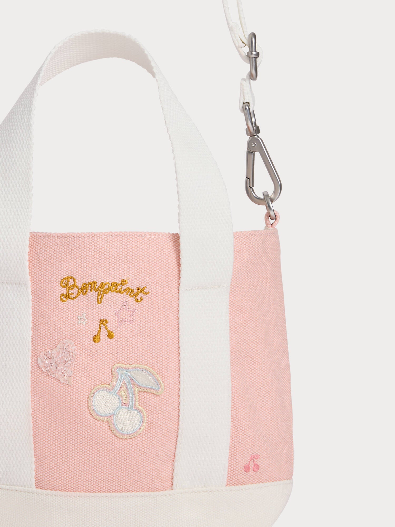 Sac bandoulière avec écussons et broderies